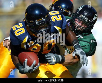 California running back Justin Forsett, top, is lifted in the air by  teammate Noris Malele after scoring on a 39-yard run against Louisiana Tech  in the first half of a college football