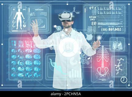 Medical technology concept. Doctor using virtual reality headset to study health data of patient Stock Photo