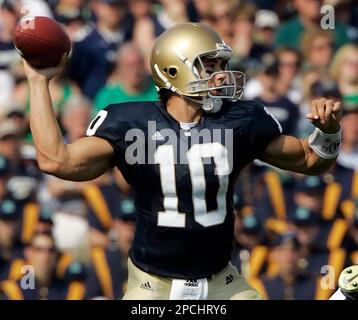 Ohio State's A. J. Hawk sacks Notre Dame's quarterback Brady Quinn on  fourth down for a 4-yard loss to stop an Irish drive during first quarter  action at the Fiesta Bowl at