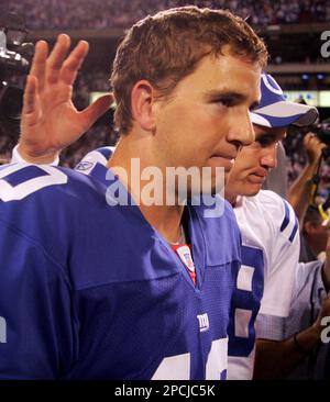 Indianapolis Colts' Peyton Manning puts on his helmet during the first half  of the NFL football game in Orchard Park, N.Y., Sunday, Jan. 3, 2010. (AP  Photo/ David Duprey Stock Photo - Alamy