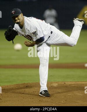 Minnesota Twins starter Johan Santana delivers a pitch in the third inning  as the Toronto Blue Jays host the Twins in their home opener at the Rogers  Center in Toronto, Canada on