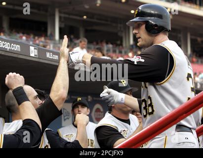 Pittsburgh Pirates' Jason Bay (38) is congratulated by Jack Wilson