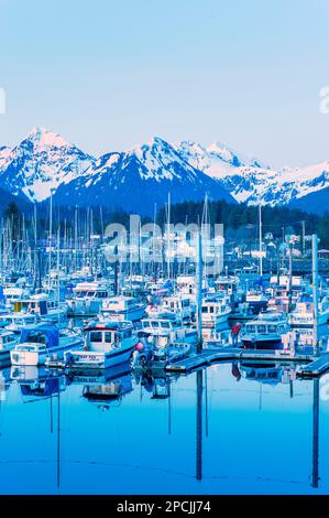 Evening time glassy calm waters in Crescent harbor, Sitka, Alaska, USA Stock Photo