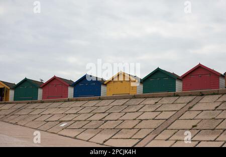 colourful beach huts in Devon Stock Photo