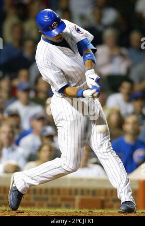 Pittsburgh Pirates' Derrek Lee hits an RBI single against the Chicago Cubs  during the first inning of a baseball game on Saturday, Sept. 3, 2011, in  Chicago. (AP Photo/Nam Y. Huh Stock