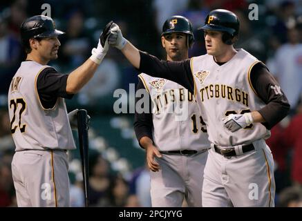 Pittsburgh Pirates' Xavier Nady, left, is greeted by teammate Adam LaRoche  (25) who was on base for his two-run seventh-inning homer off Los Angeles  Dodgers pitcher Derek Lowe in baseball action in
