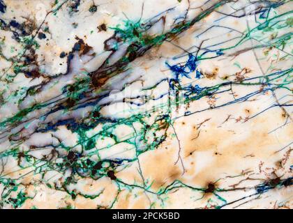 Detail of mineral veins running thru a slice of rock. The blue and green are Azurite and Malachite respectively. Stock Photo