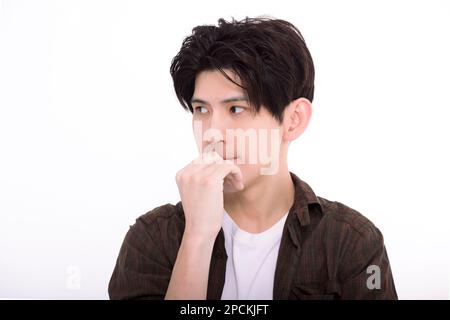Young man  thinking and worry for problem Stock Photo