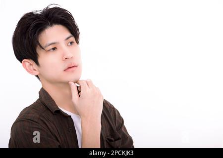 Young man  thinking and worry for problem Stock Photo