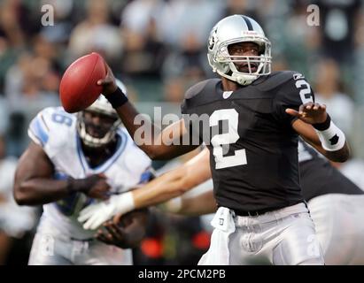 Oakland Raiders quarterback Aaron Brooks (2) is hit by Cincinnati