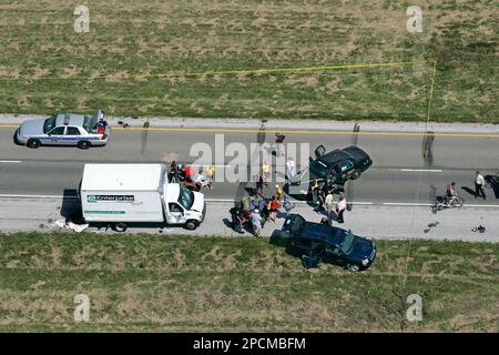 Police investigate the scene of an accident that claimed the life