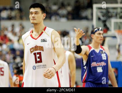 Yao Ming scores 21 points in win over Angola
