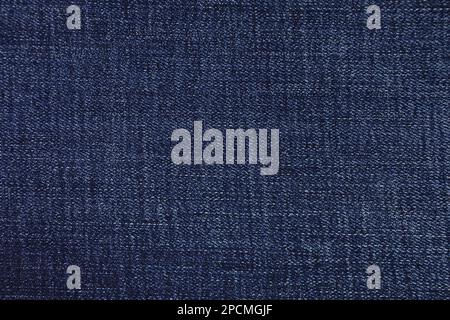 Blue jeans fabric background texture. Blue jeans fabric cloth textile material. Stock Photo