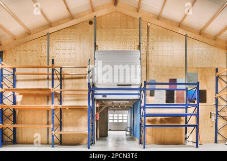 the inside of a building that is being used as a storage room for an ...