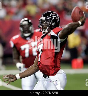 Atlanta Falcons quarterback Michael Vick (7) runs out of the pocket for  first down yardage in the second quarter against the New Orleans Saints  December 12, 2005 in AtlantaÕs Georgia Dome. The