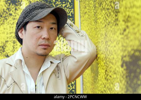 Japanese film director Omori Tatsushi poses during a photocall, prior