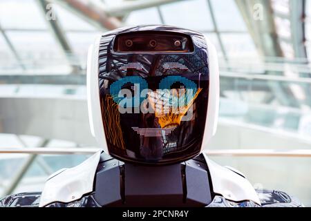 robot portrait close-up. smiling face of robot. Autonomous personal assistant robot for navigation direction in Museum Energy of Future. Astana Nur-Su Stock Photo