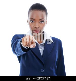 This is serious. Studio portrait of a young businesswoman pointing at the camera isolated on white. Stock Photo