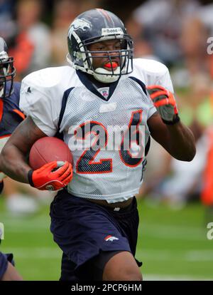 Denver Broncos running back Tatum Bell (26) celebrates coming off the field  after scoring a touchdown in the second quarter, December 31, 2005, in  Qualcomm Stadium in San Diego. The Broncos defeated