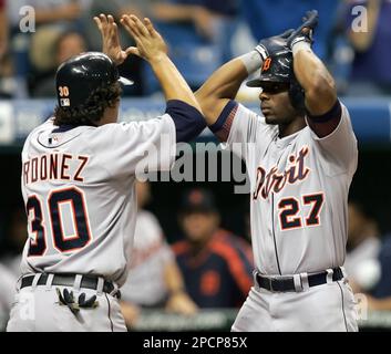 Detroit Tigers Craig Monroe is congratulated by teammate Curtis