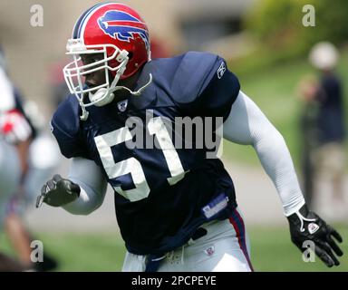 Buffalo Bills linebacker Takeo Spikes adjusts his head-band during  stretching exercises at minicamp practice at the Ralph Wilson Stadium  complex in Orchard Park, N.Y., Thursday, June 10, 2004. It may only be