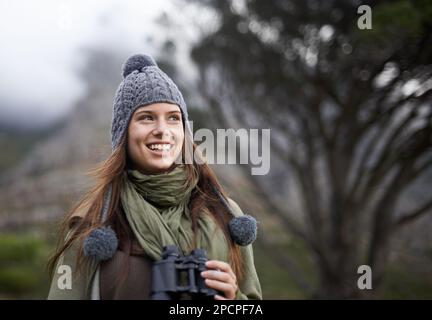 Out for a hike on a crisp morning. A gorgeous brunette going for a hike on a crisp morning. Stock Photo
