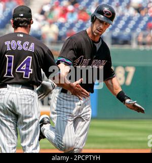 Arizona Diamondbacks' Luis Gonzalez, right, embraces teammate Craig Counsell  after Counsell hit a solo home run against the San Diego Padres during the  fourth inning of a baseball game Sunday, Oct. 1