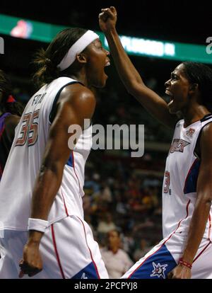 https://l450v.alamy.com/450v/2pcpyj8/detroit-shocks-cheryl-ford-left-celebrates-a-foul-and-possible-three-point-play-against-her-with-teammate-swin-cash-during-the-second-half-of-their-wnba-basketball-game-against-sacramento-monarchs-on-wednesday-july-26-2006-in-auburn-hills-mich-the-shock-won-91-71-ap-photojerry-s-mendoza-2pcpyj8.jpg