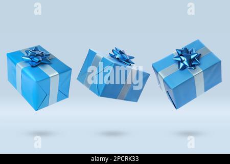 Beautifully wrapped gift boxes flying on light background Stock Photo