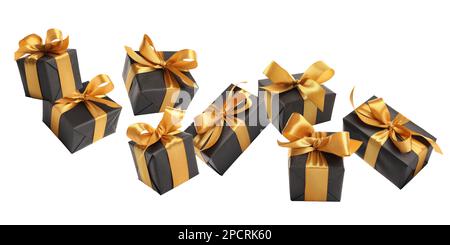 Beautifully wrapped gift boxes flying on white background Stock Photo