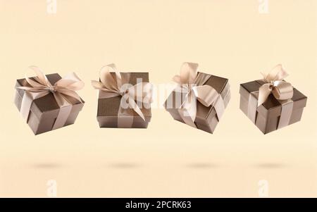 Beautifully wrapped gift boxes flying on beige background Stock Photo
