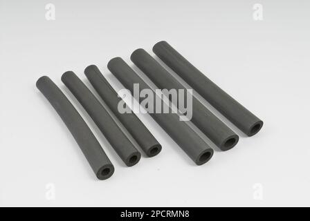 Roll of gray foam rubber sheet isolated in white. High quality photo Stock Photo