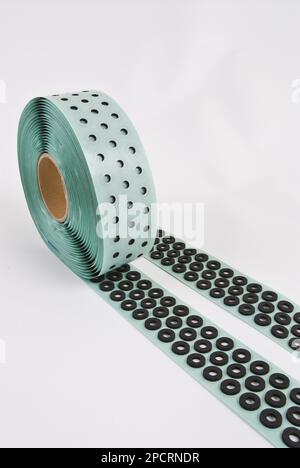 Roll of gray foam rubber sheet isolated in white. High quality photo Stock Photo