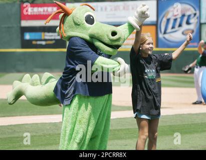 Charlotte Knights mascot Homer the Dragon celebrates on the field following  the International League game against the Memphis Redbirds at Truist Field  on April 2, 2023 in Charlotte, North Carolina. (Brian Westerholt/Four