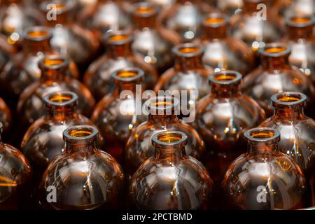 large antique glass bottle with light green liquid as medicine and herbal  mixture Stock Photo - Alamy