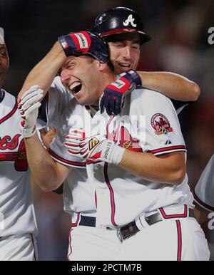 Jeff Francoeur, a player for the Atlanta Braves signs an autograph for a  military family member during a luncheon at Fort Bragg, N.C., July 3, 2016.  The event is a part of