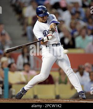 FILE ** Chicago Cubs shortstop Nomar Garciaparra throws to first base in  this Aug. 15, 2005, file photo, in Houston. Garciaparra may be joining the  Los Angeles Dodgers, a source close