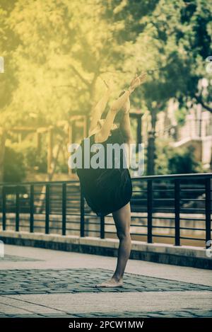 Barefooted ballet dancer dancing in the street Stock Photo