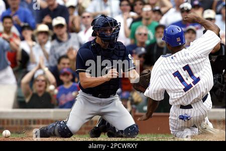 Chicago Cubs' Aramis Ramirez is out as he slides under New York Mets' Jose  Reyes to break up a double play during the third inning of their baseball  game, Monday, July 24