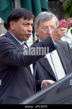 FILE ** Mittal Steel President Aditya Mittal, left, and Chief Executive  Officer Lakshmi Mittal, right, are seen at the start of a media conference  in Rotterdam, the Netherlands, in this Tuesday