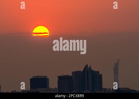 The Torch Tower in Doha Sport City Complex at sunset next to Aspire Zone Stock Photo