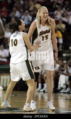 Seattle Storm's Lauren Jackson, right, celebrates with Sue