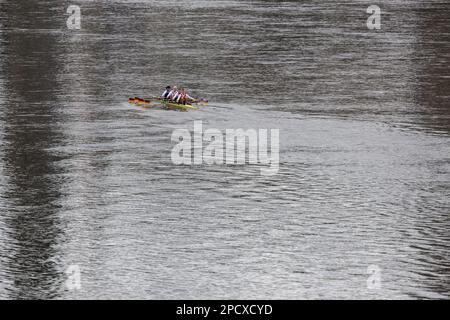 Dresden, Germany. 14th Mar, 2023. A four-man rowing boat without coxswain sails along the Elbe in the city center in the morning. The level of the Elbe in Dresden is currently about 3.10 meters. Credit: Robert Michael/dpa/Alamy Live News Stock Photo