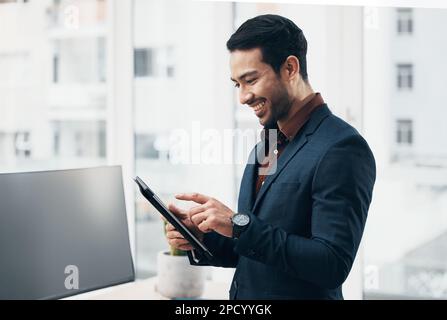 Company tablet, smile and business man typing on digital dashboard, IOT or interactive smart tech for office automation. Internet of things, ui Stock Photo