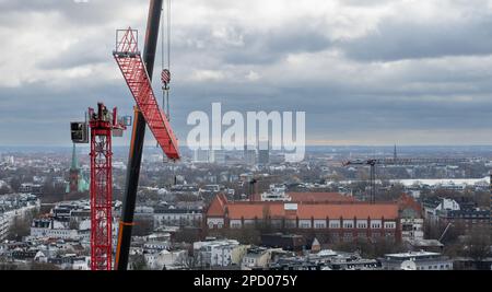 Assembling a construction crane in Hamburg, Germany. Stock Photo