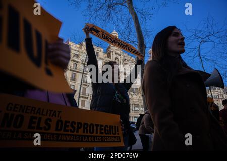 Barcelona, Barcelona, Spain. 14th Mar, 2023. Animal and nature protection entities protest in front of the Department of Climate Action, Food and Rural Agenda. The protest takes place after the proposal to modify the Animal Protection Law of Catalonia, which negatively affects hunting dogs, has been voted. (Credit Image: © Marc Asensio Clupes/ZUMA Press Wire) EDITORIAL USAGE ONLY! Not for Commercial USAGE! Credit: ZUMA Press, Inc./Alamy Live News Stock Photo