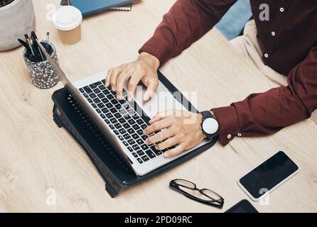 Business man, hands and laptop on desk, information technology and tech support top and working in office. Typing, glitch or 404 with software update Stock Photo