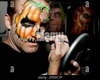 Scary face painting book by Nick Wolfe