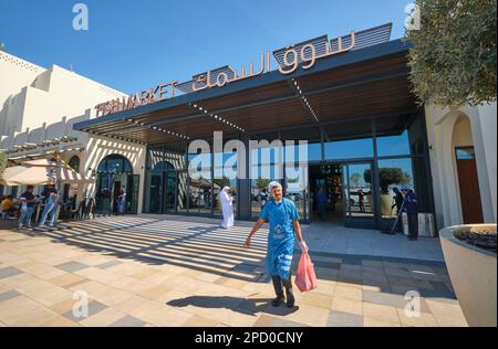 The front entrance, facade and sign of the new building. At the fish market cooperative in Abu Dhabi, UAE, United Arab Emirates. Stock Photo