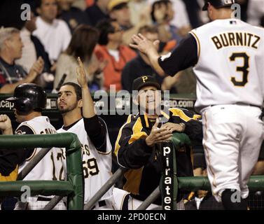 Pittsburgh Pirates shortstop Jack Wilson, left, watches as St. Louis  Cardinals' Albert Pujols trots past after hitting a fourth-inning solo  homer off Pittsburgh Pirates starter Oliver Perez during MLB baseball  action in